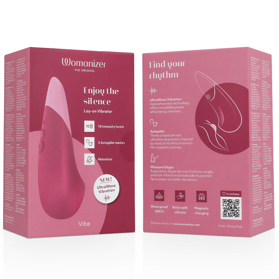 Dusky pink Womanizer Vibe lay-on silent vibrator with sleek ergonomic design on pink packaging box.
