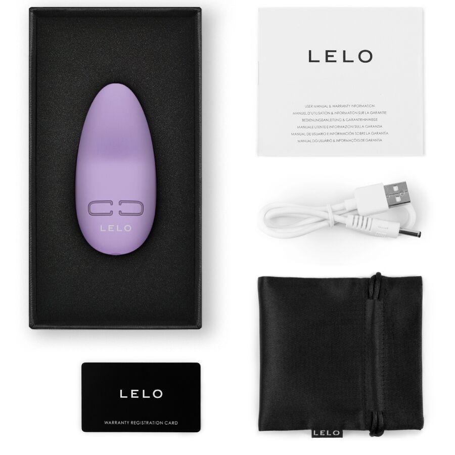 Lilac LELO Lily 3 personal massager with USB charging cable, black storage pouch, and manuals in black box.