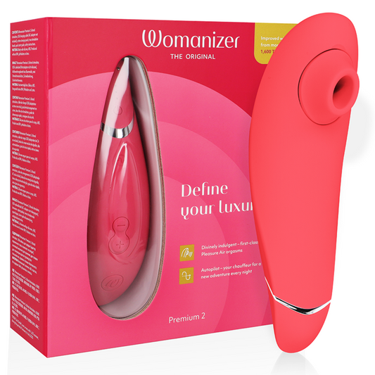 Raspberry pink Womanizer Premium 2 clitoral stimulator with ergonomic design and silicone texture next to matching pink.