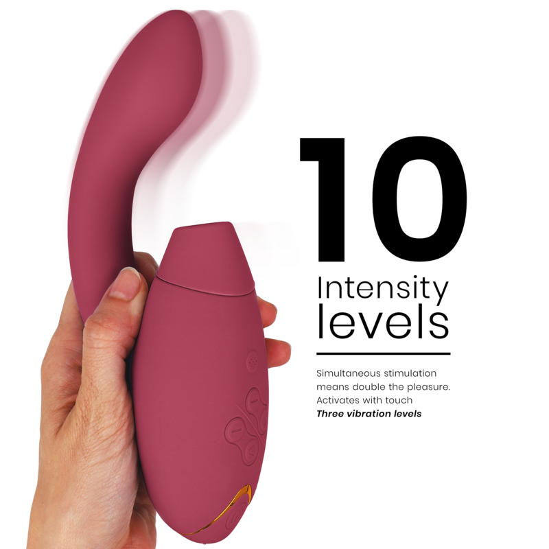 Bordeaux Womanizer Duo 2 stimulator with ergonomic curved design and textured control buttons.