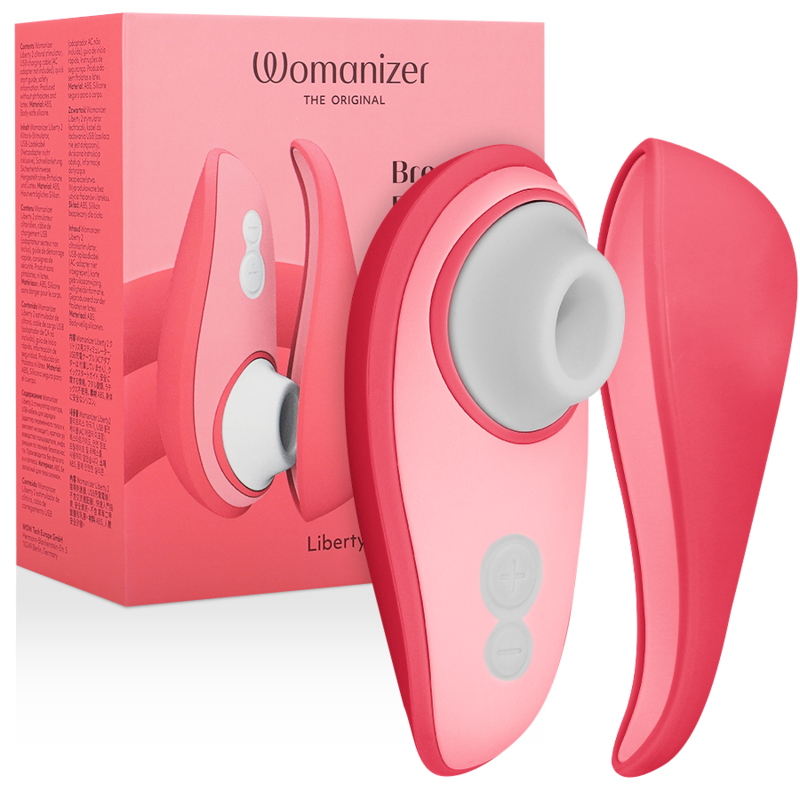 Pink Womanizer Liberty 2 clitoris stimulator with suction head and ergonomic design next to matching pink storage case and.