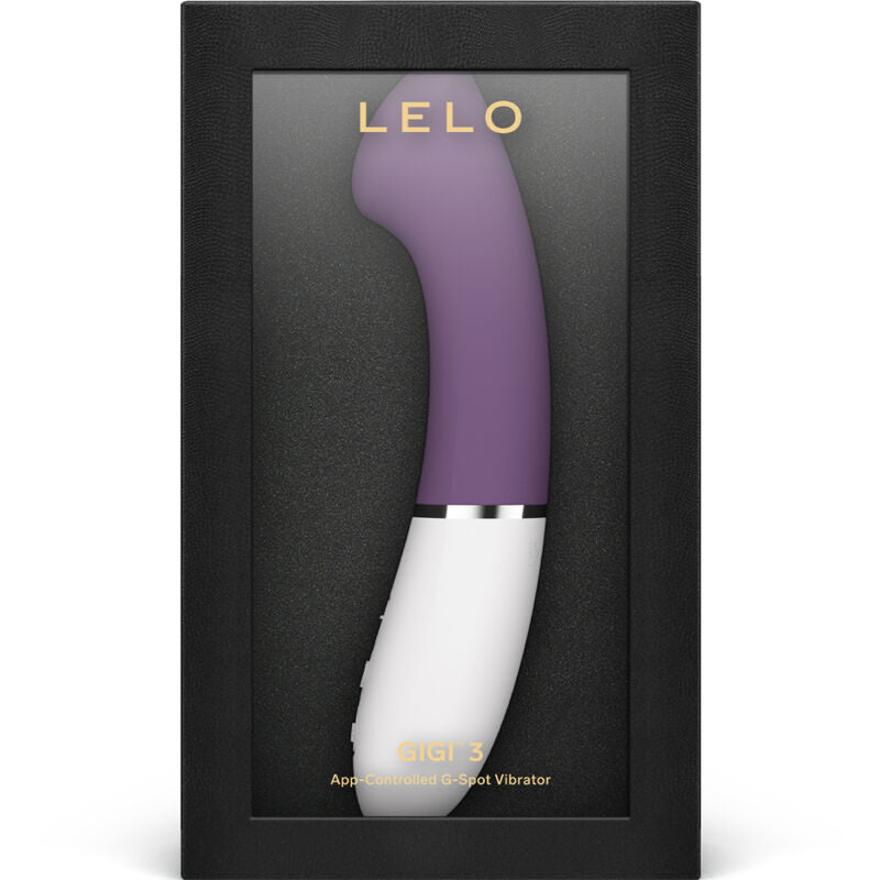 Purple and white curved G-spot vibrator with silver accent ring in black packaging.