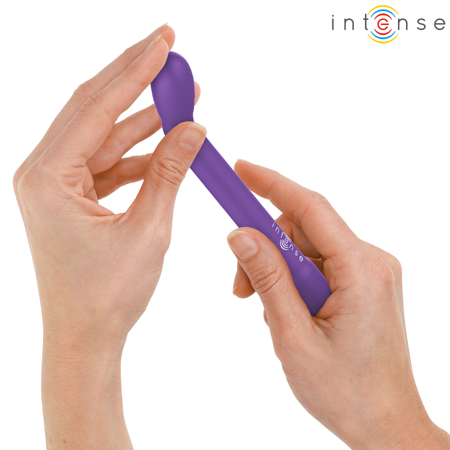 Purple curved G-spot stimulator held between two hands with textured grip and control buttons.