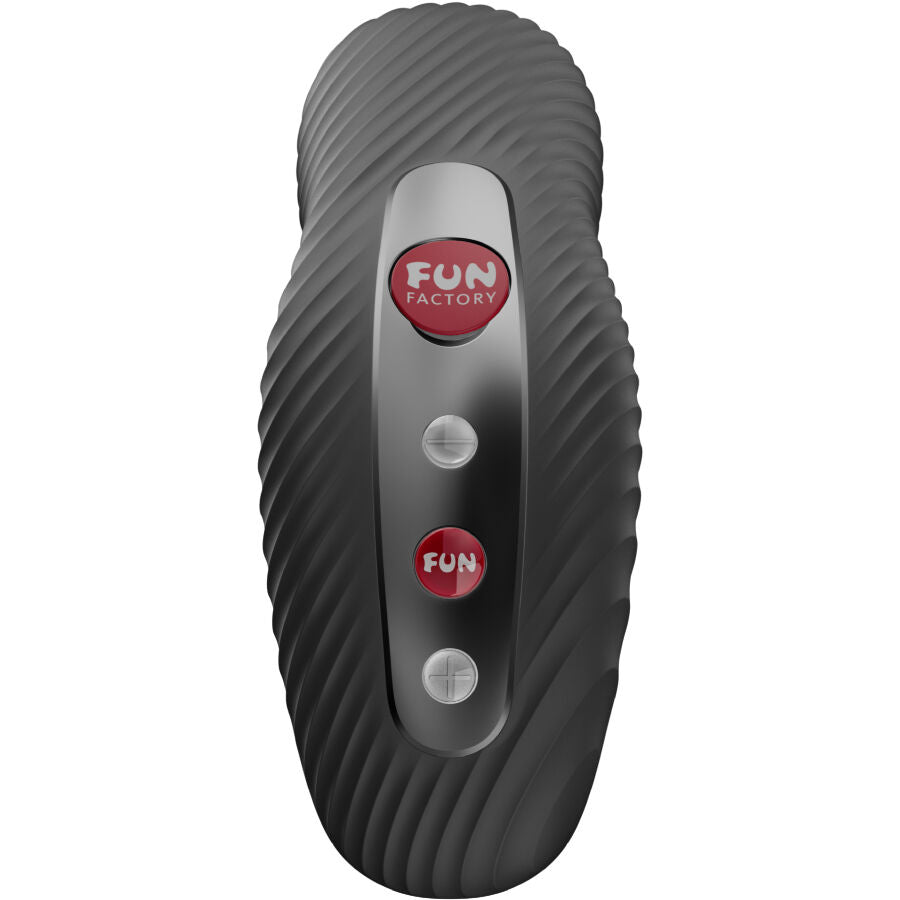Black textured lay-on vibrator with curved ridges and three buttons on top panel.