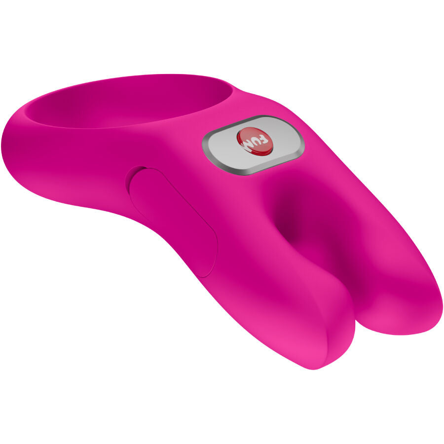 Magenta silicone vibrating cock ring with dual-prong design and silver control button.