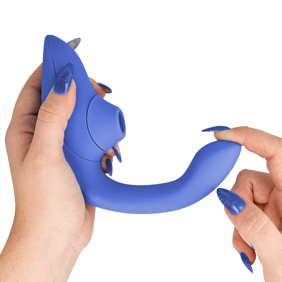 Vibrant blue rabbit vibrator stimulator with curved shaft and clitoral suction tip held by hand.