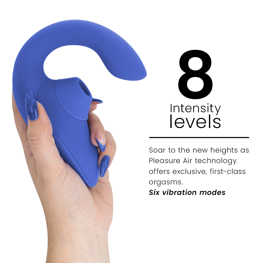 Vibrant blue curved rabbit vibrator stimulator with textured silicone surface held in hand.