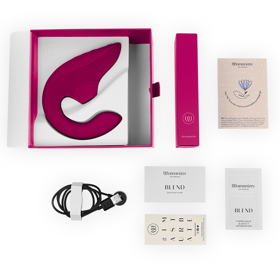Vibrant pink rabbit vibrator stimulator in open box with charging cable, pink sleeve, and instruction manuals.