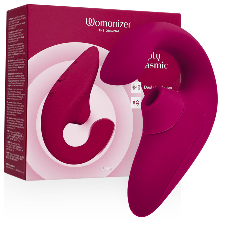 Vibrant pink Womanizer Blend Rabbit Vibrator with curved design and textured clitoral stimulator beside matching product box.