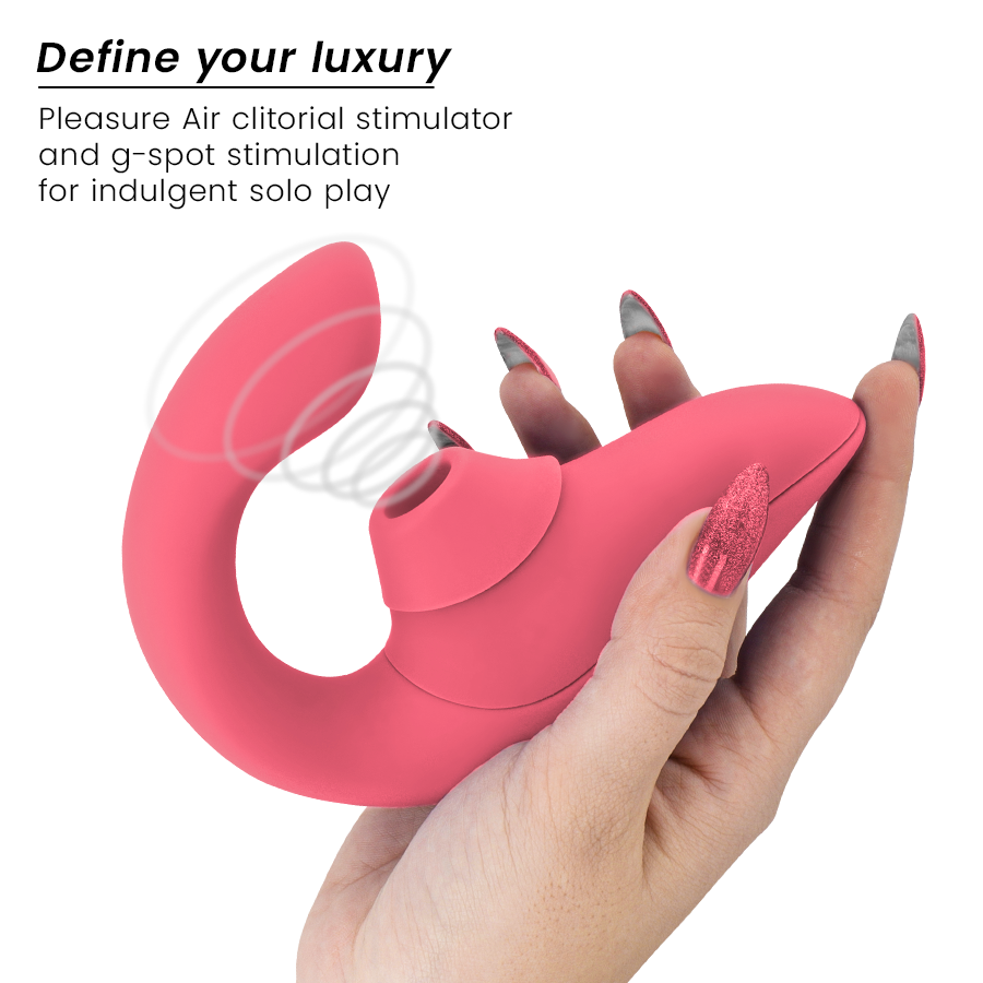 Vibrant rose curved rabbit vibrator stimulator held in hand with silicone texture and suction tip.