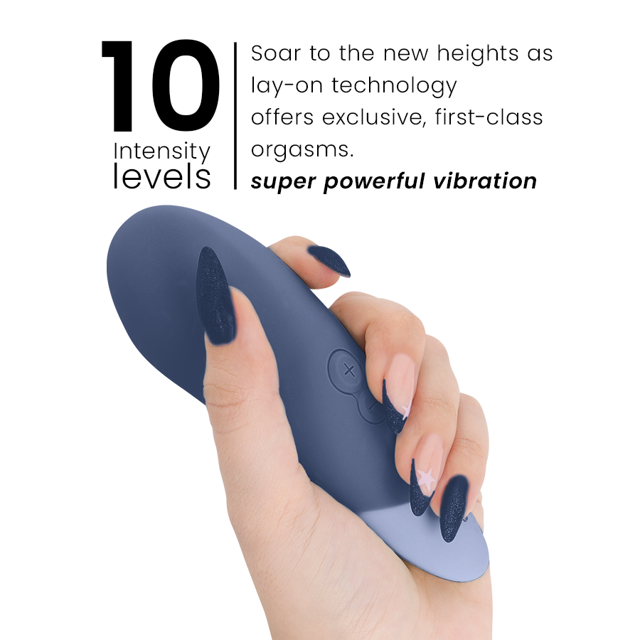 Dark blue ergonomic vibrator with rounded tip and two control buttons held in hand.
