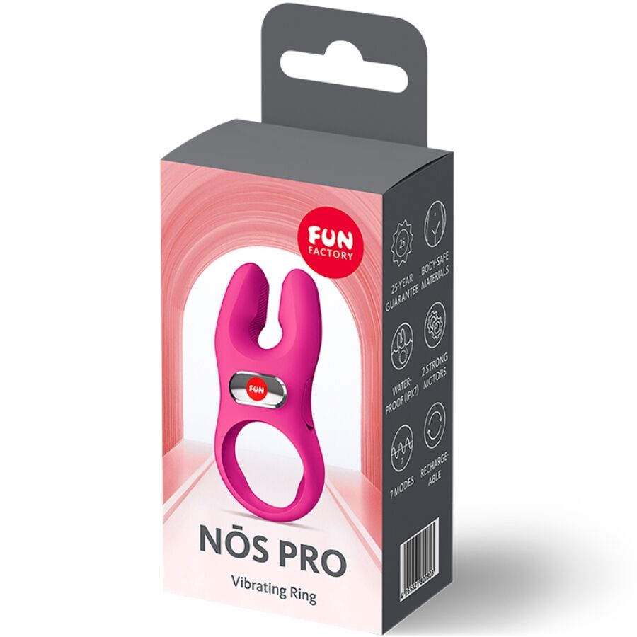 Magenta vibrating cock ring with dual prongs inside a branded white and pink box.